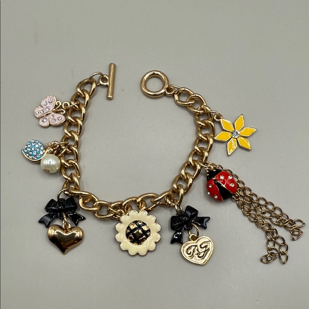 Betsey Johnson Gold Tone Charm Ladybug Flower Bow Bangle Statement Bracelet